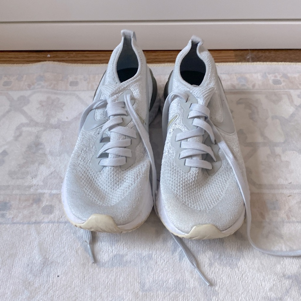 Grey Nike tennis shoes